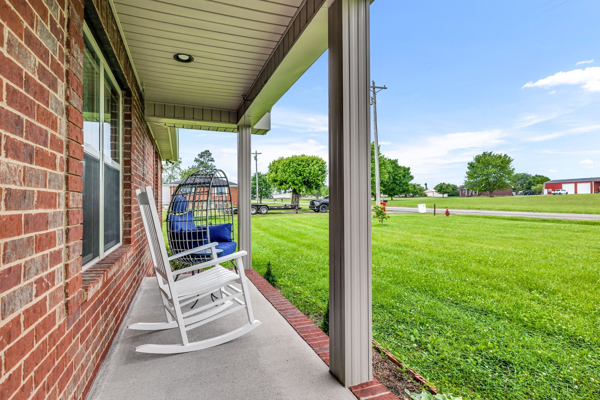 2164 Akersville Road Lafayette, TN 37083 - Photo 6 of 32 a view of porch with a backyard