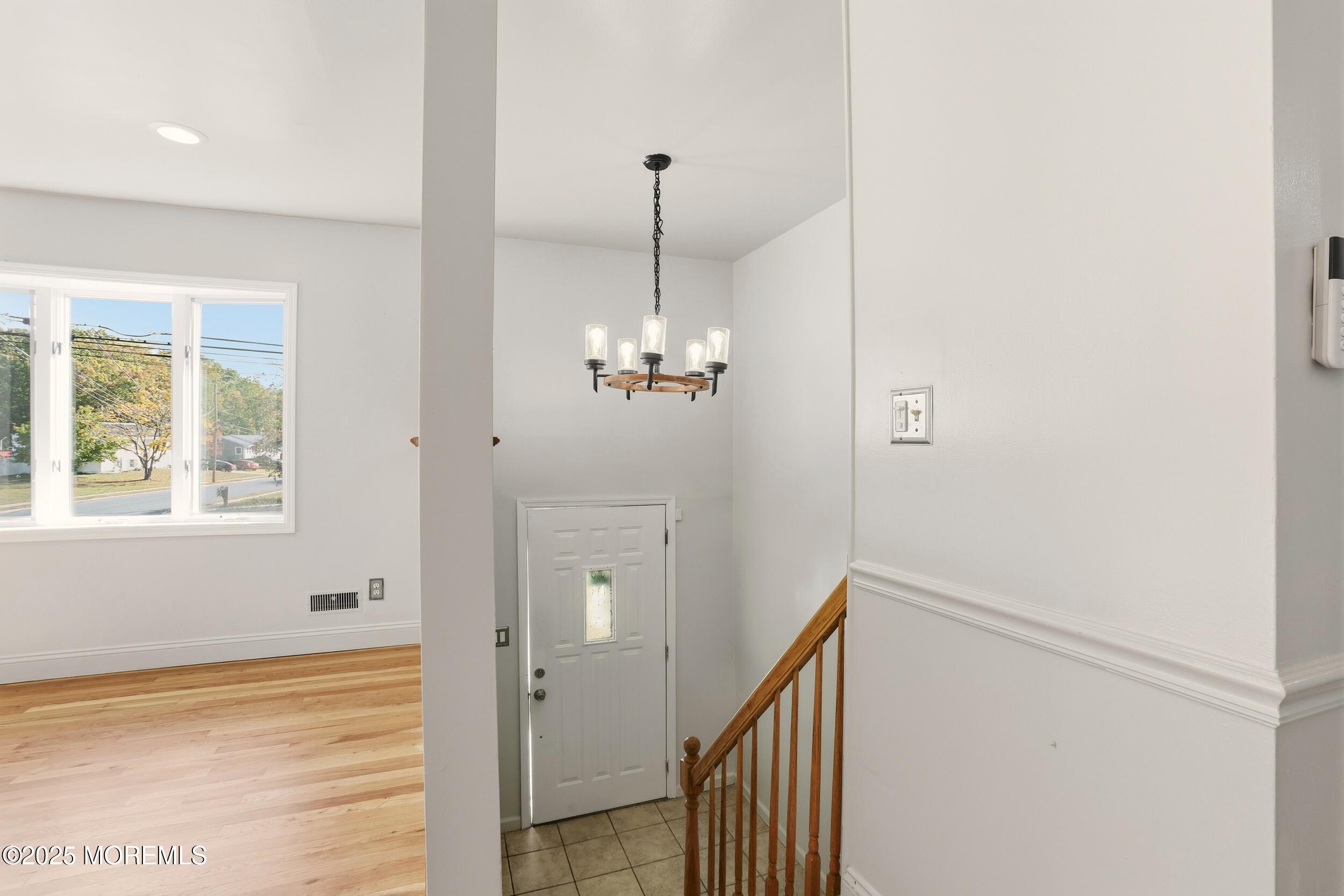 19 Kensington Drive Howell, NJ 07731 - Photo 16 of 31 a view of a room with wooden floor and windows