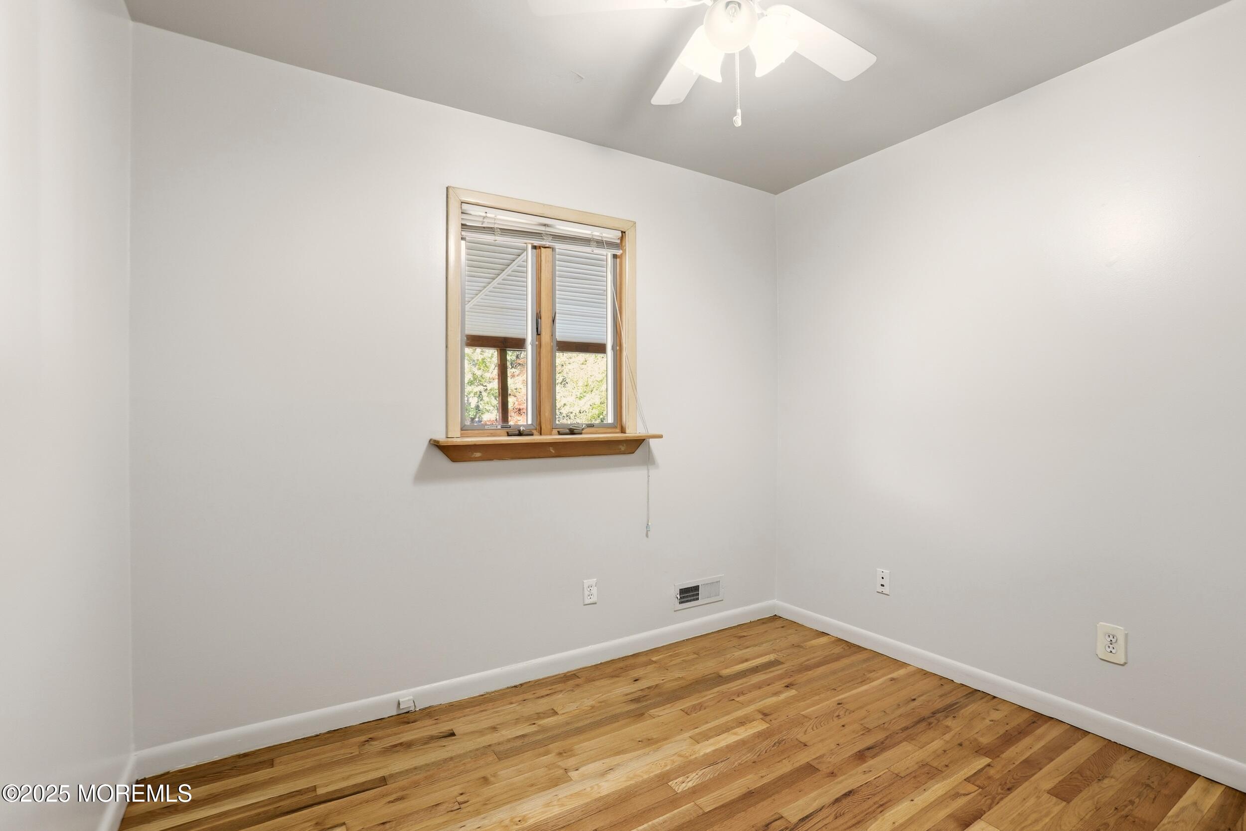 19 Kensington Drive Howell, NJ 07731 - Photo 20 of 31 an empty room with a window