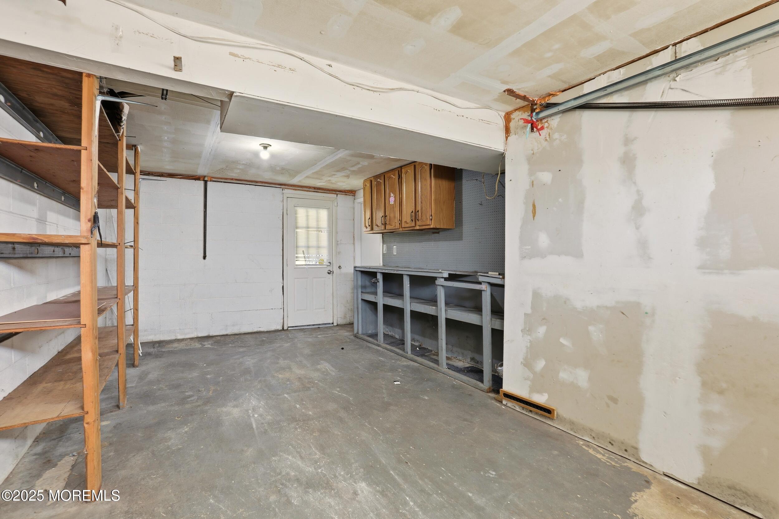 19 Kensington Drive Howell, NJ 07731 - Photo 28 of 31 a view of walk in closet with window