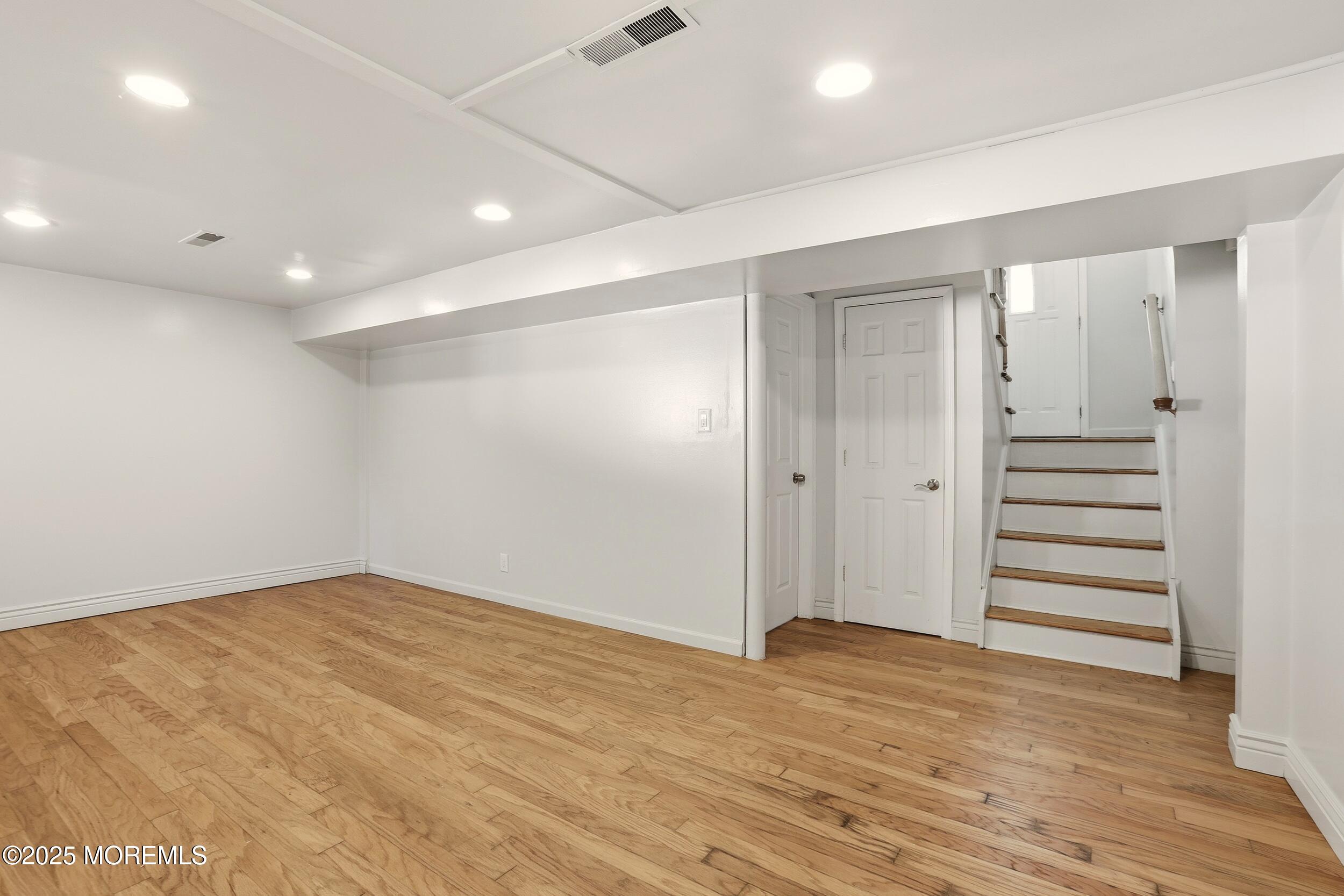 19 Kensington Drive Howell, NJ 07731 - Photo 10 of 31 a view of entryway with wooden floor