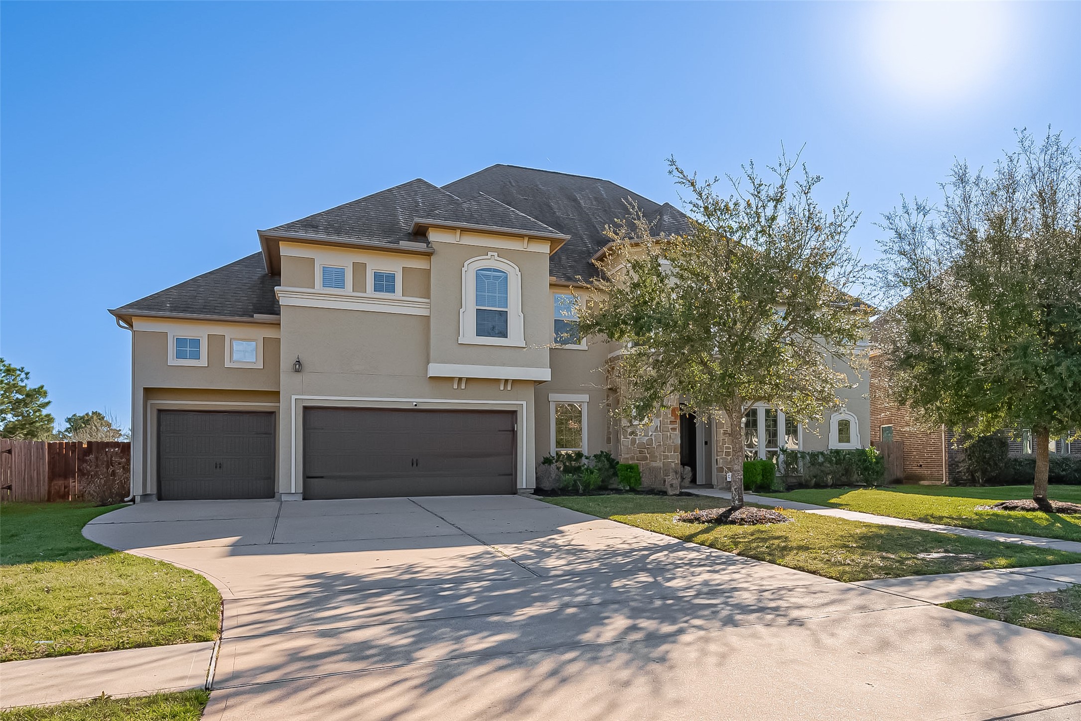 10018 Durango Path Lane Cypress, TX 77433 - Photo 6 of 50 Expansive four-car garage offering ample space for vehicles and storage!