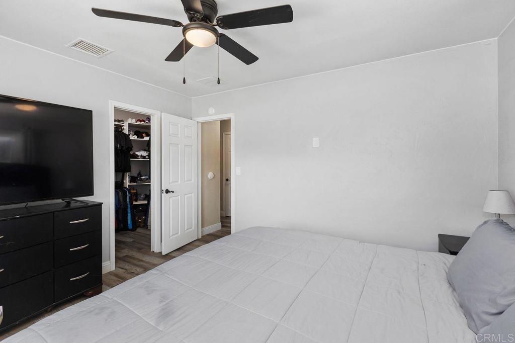 8229 Medill Avenue El Cajon, CA 92021 - Photo 17 of 34 en empty room with closet and flat screen tv