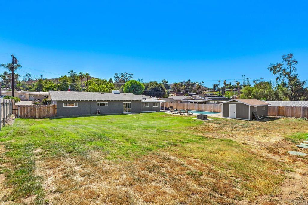 8229 Medill Avenue El Cajon, CA 92021 - Photo 31 of 34 a view of swimming pool with a yard