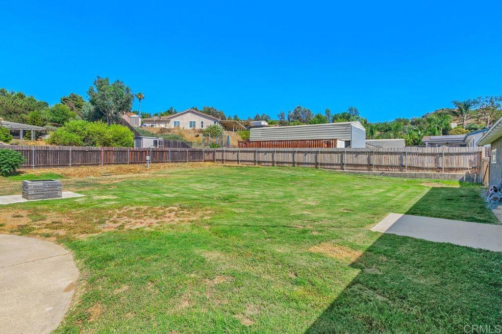 8229 Medill Avenue El Cajon, CA 92021 - Photo 33 of 34 a view of a garden with a building in the background