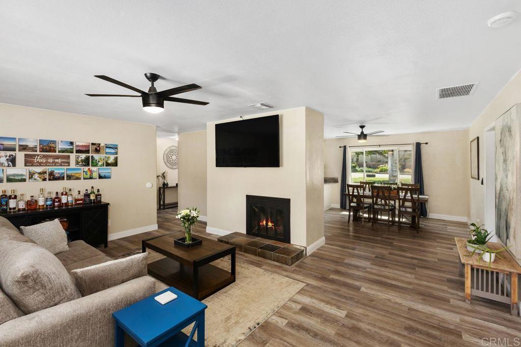 8229 Medill Avenue El Cajon, CA 92021 - Photo 7 of 34 a living room with furniture and a fireplace