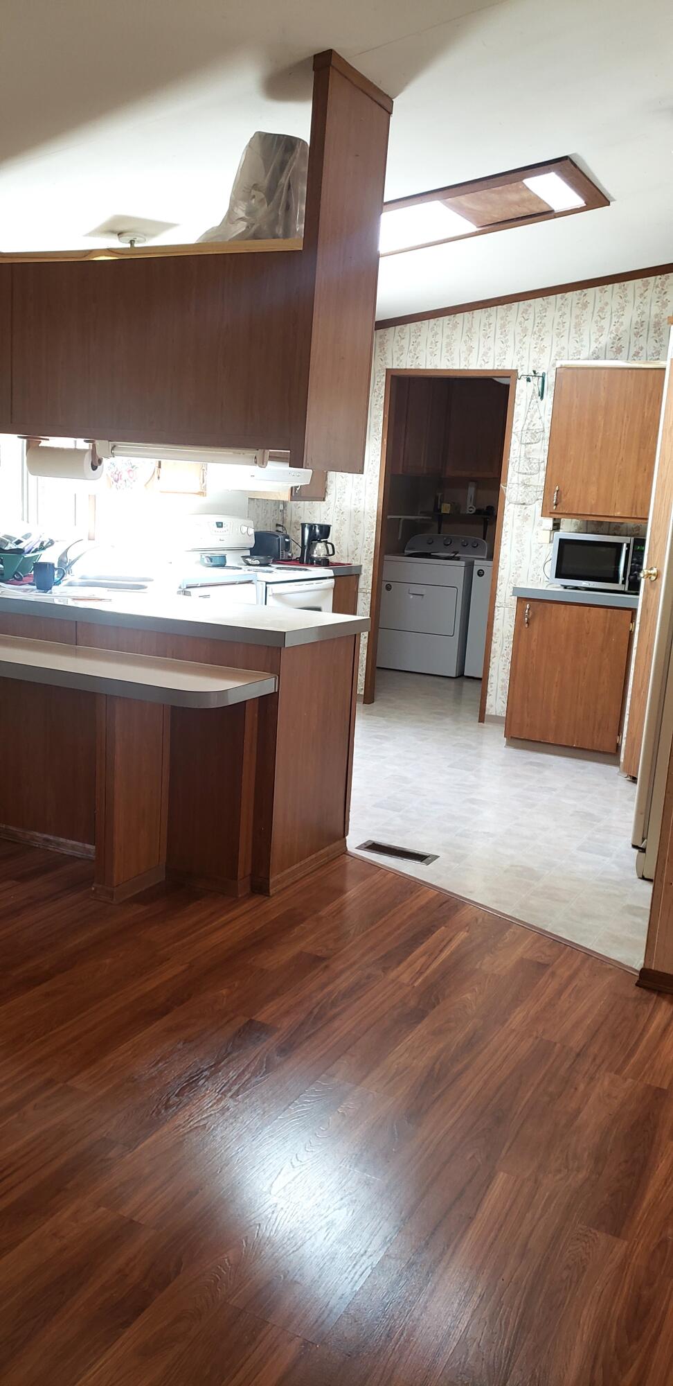 7055 Takilma Road Cave Junction, OR 97523 - Photo 7 of 26 dining room-laminate floor kit. beyond