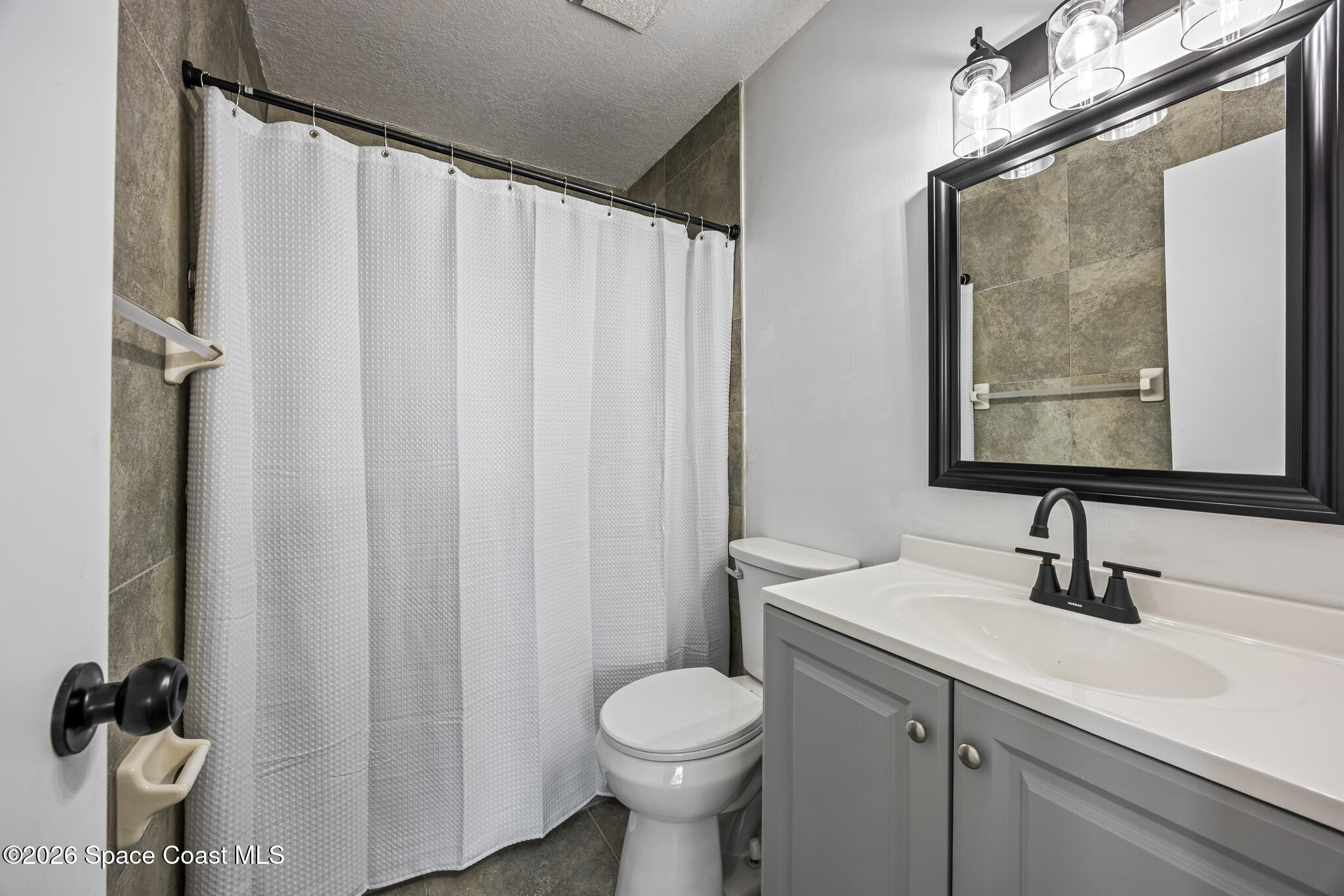 2857 Pennington Place Melbourne, FL 32935 - Photo 11 of 30 Primary bath