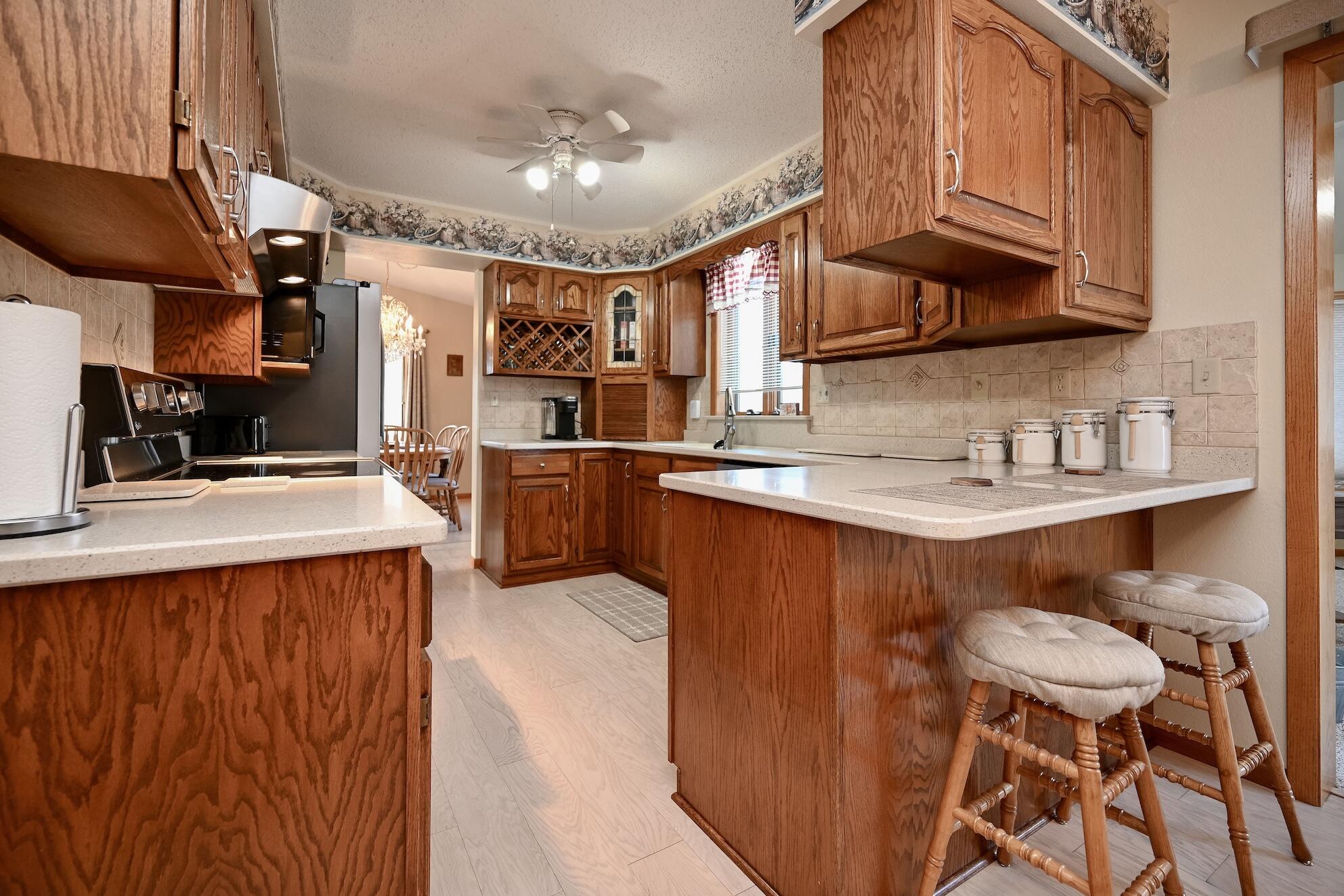 935 38th Avenue Goodview, MN 55987 - Photo 7 of 39 7 Kitchen & Breakfast Bar