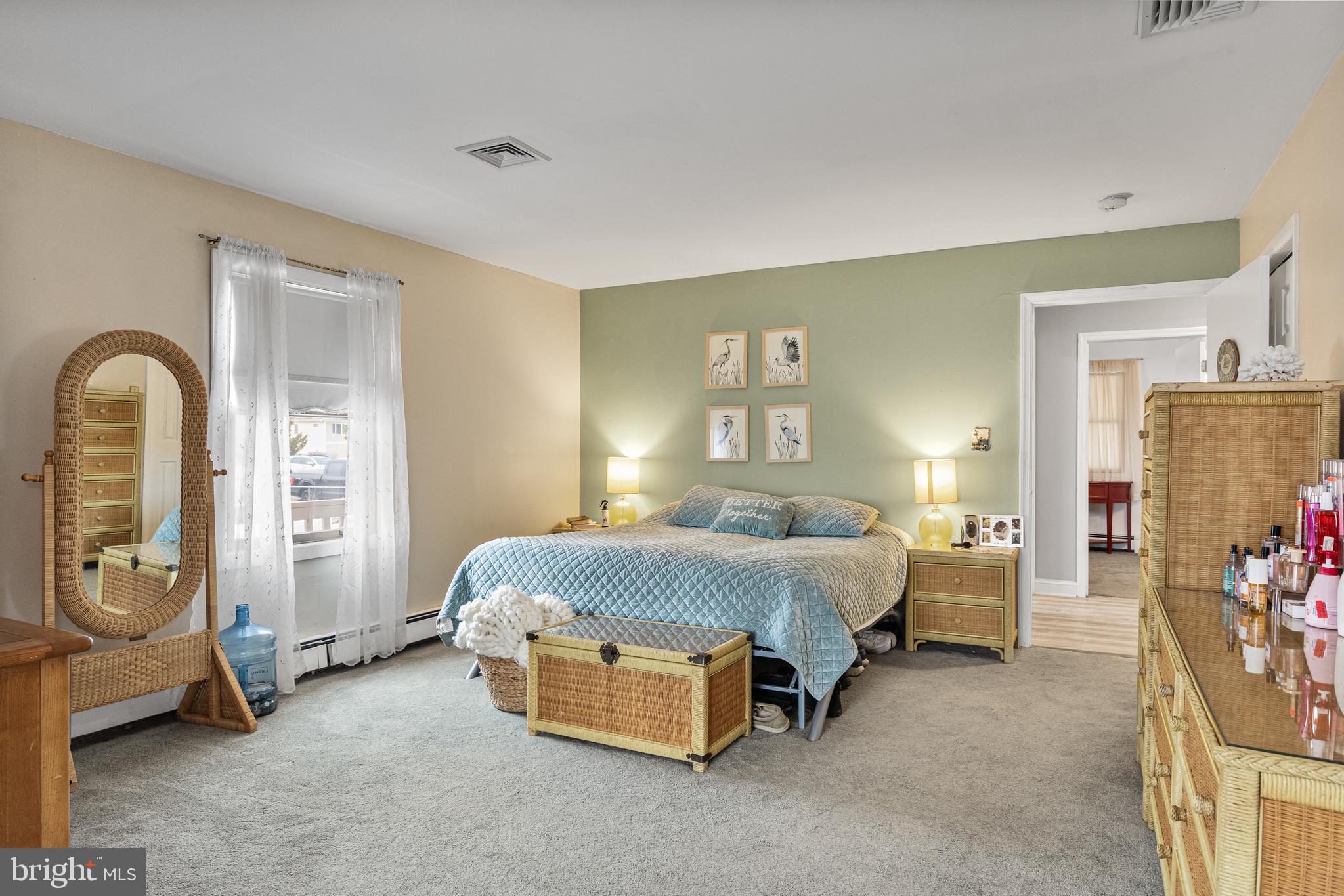 8 South Captain Drive Tuckerton, NJ 08087 - Photo 17 of 52 a spacious bedroom with a bed a couch and dresser