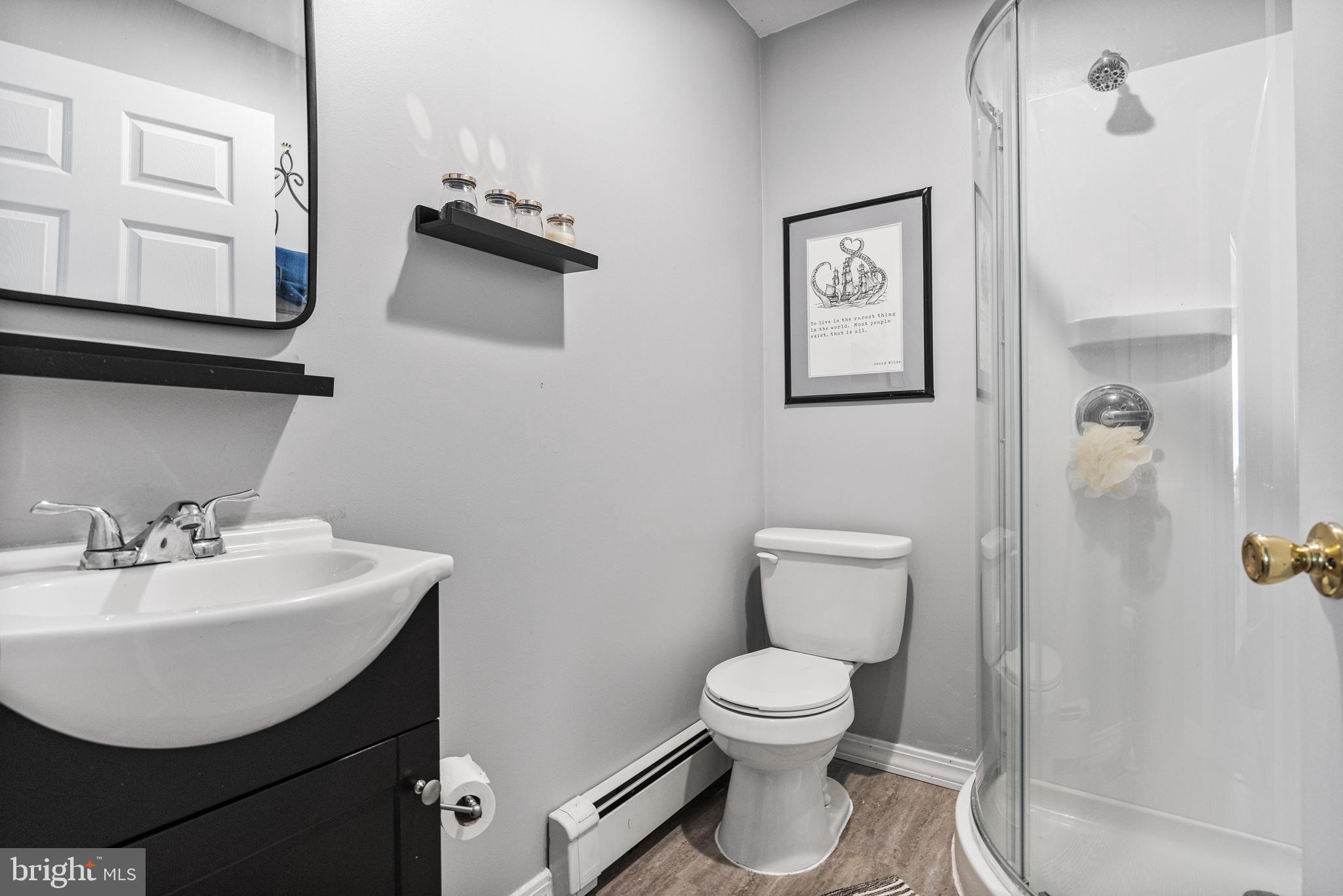 8 South Captain Drive Tuckerton, NJ 08087 - Photo 25 of 52 a bathroom with a toilet sink and mirror