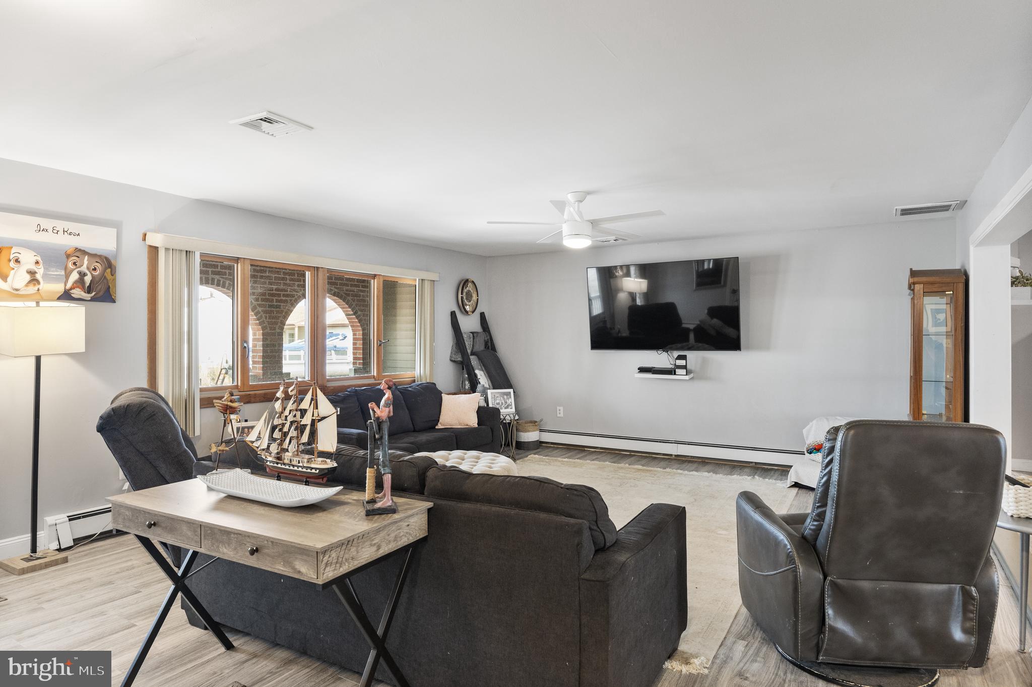 8 South Captain Drive Tuckerton, NJ 08087 - Photo 4 of 52 a living room with furniture and a flat screen tv