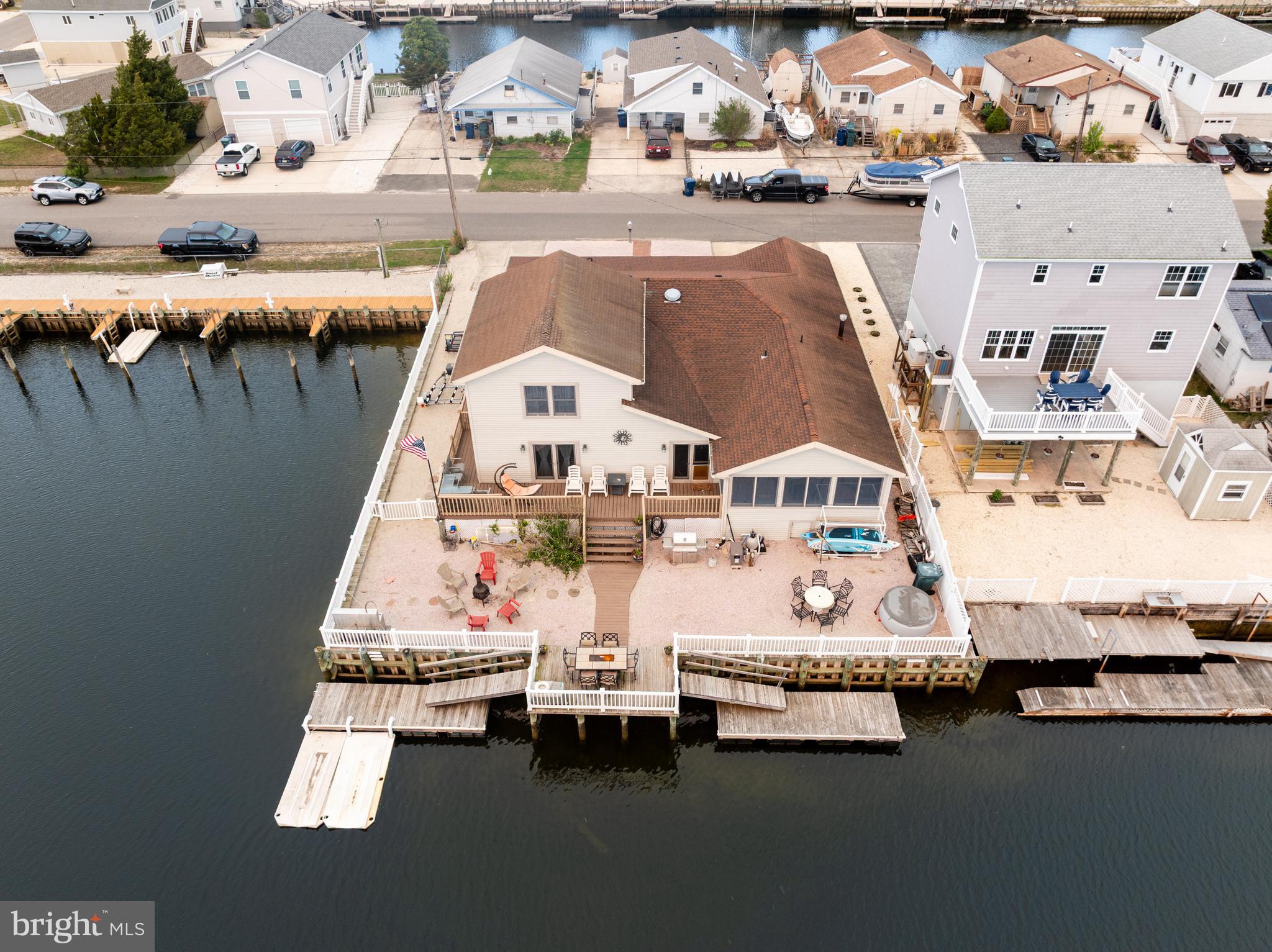 8 South Captain Drive Tuckerton, NJ 08087 - Photo 43 of 52 a bed sitting next to a building