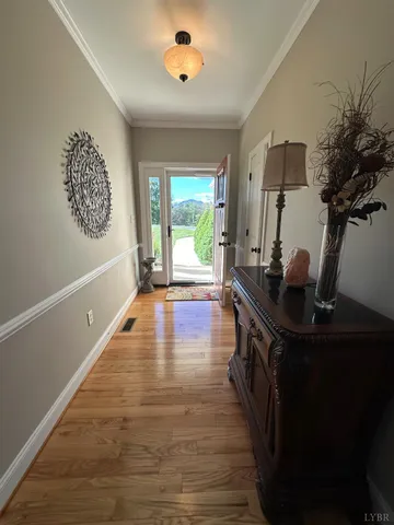 a bathroom with a sink vanity and mirror