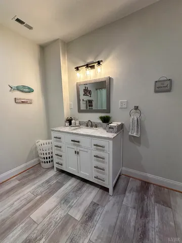 a view of a chairs on wooden deck