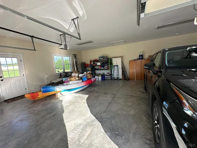 a view of an empty room with a tree