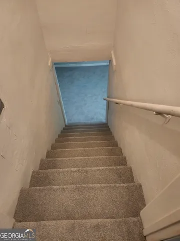 a view of a room with racks on the wall