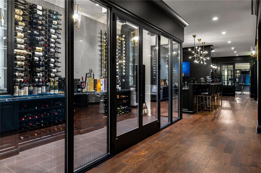 435 Myoma Road Mars, PA 16046 - Photo 33 of 50 Glass-enclosed wine cellar with extensive bottle storage and a striking gallery-like presentation.