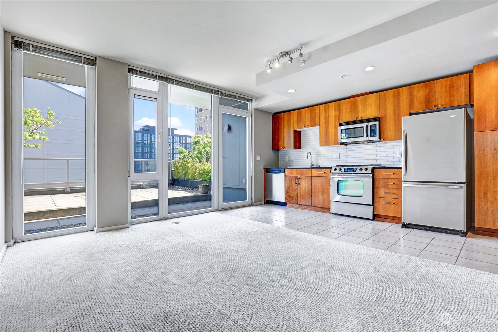 76 Cedar Street, Unit 710 Seattle, WA 98121 - Photo 2 of 20 a view of a livingroom with furniture and an entryway