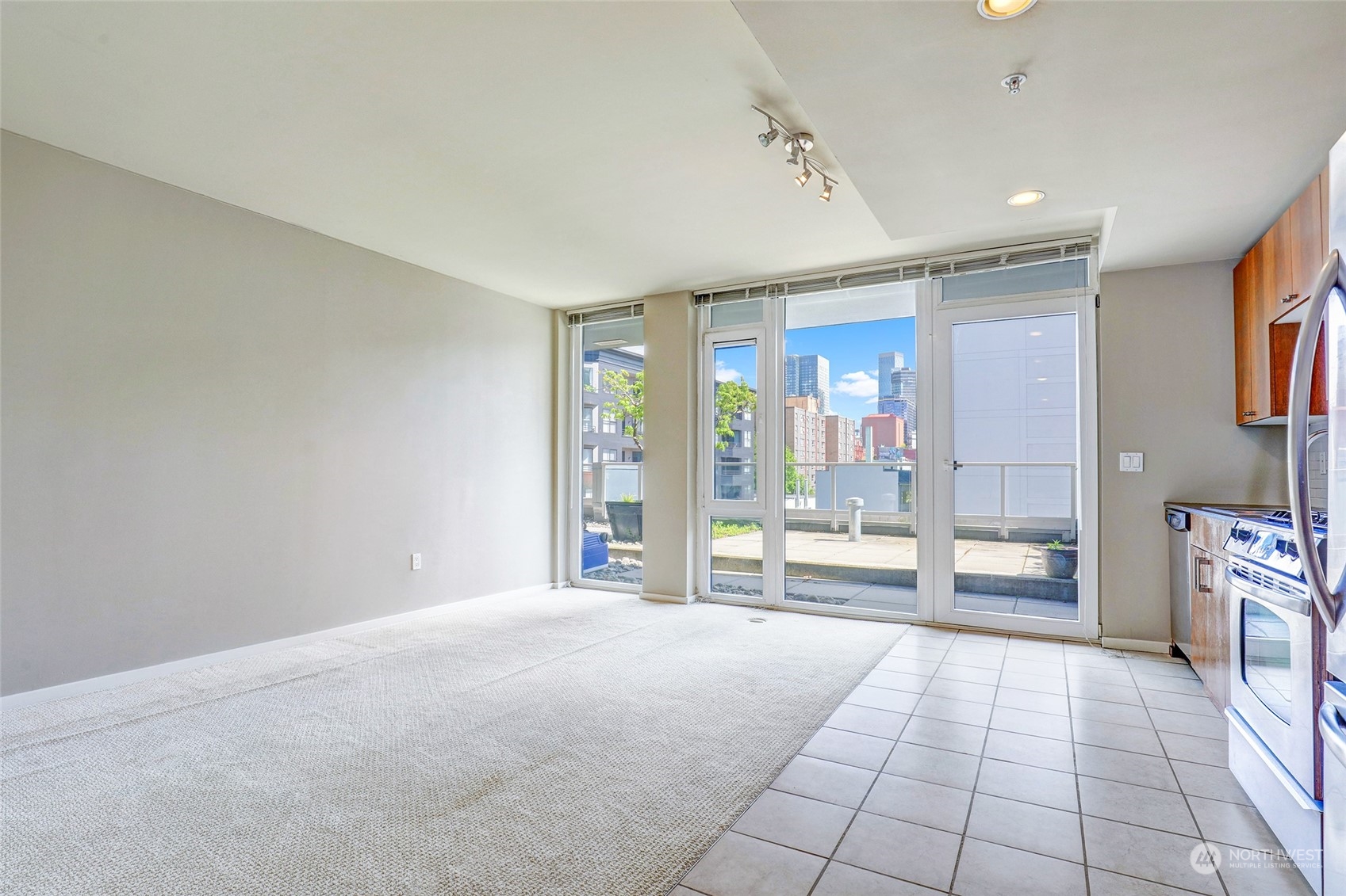 76 Cedar Street, Unit 710 Seattle, WA 98121 - Photo 5 of 20 a view of an empty room with a window