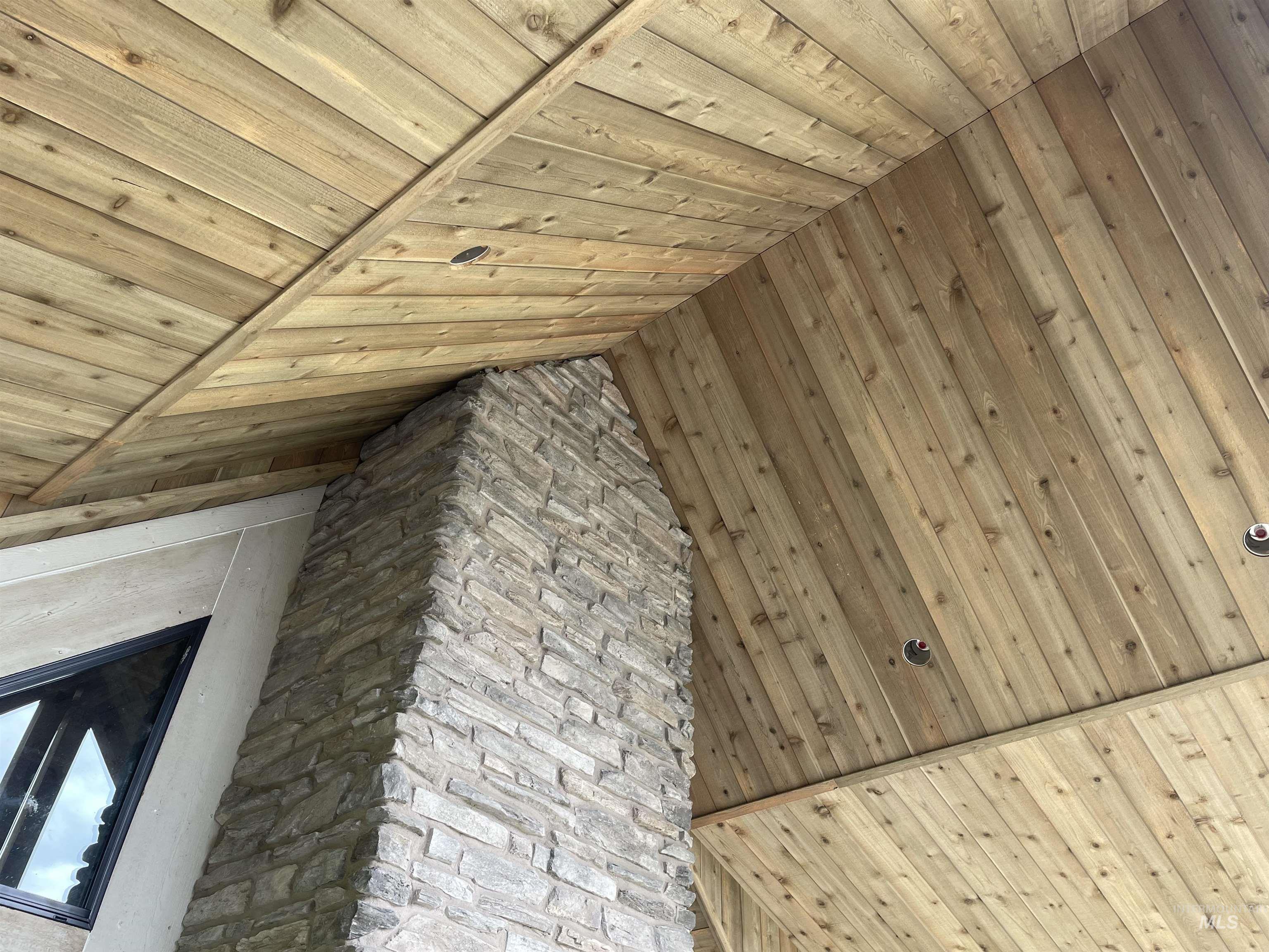 2250 Moritz Lane Indian Valley, ID 83632 - Photo 11 of 49 Detailed view of wooden ceiling and wood walls