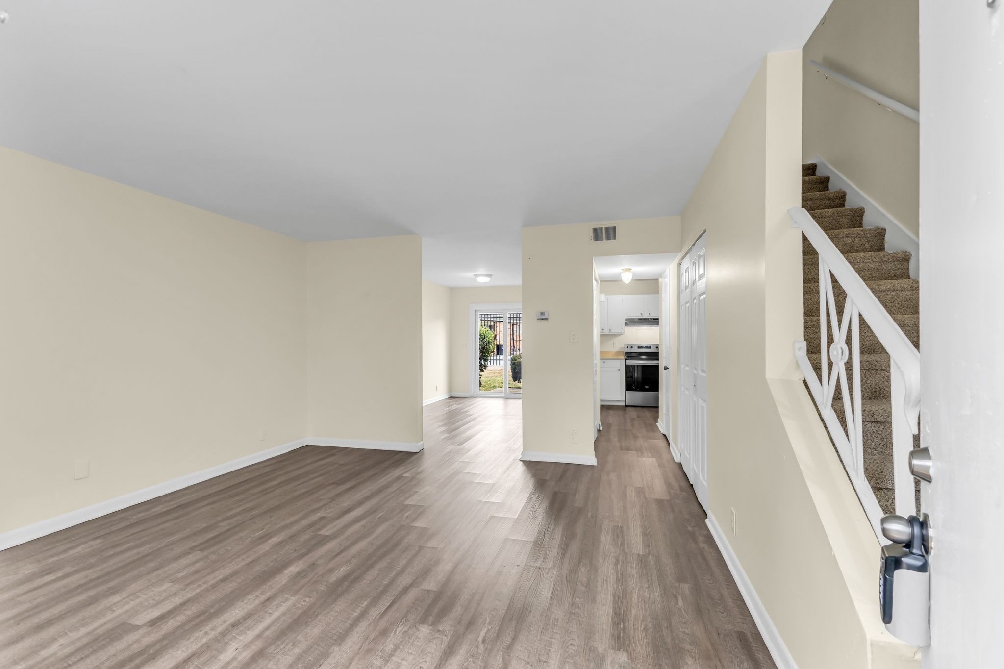 370 Wallace Road, Unit F5 Nashville, TN 37211 - Photo 7 of 28 a view of a hallway with wooden floor