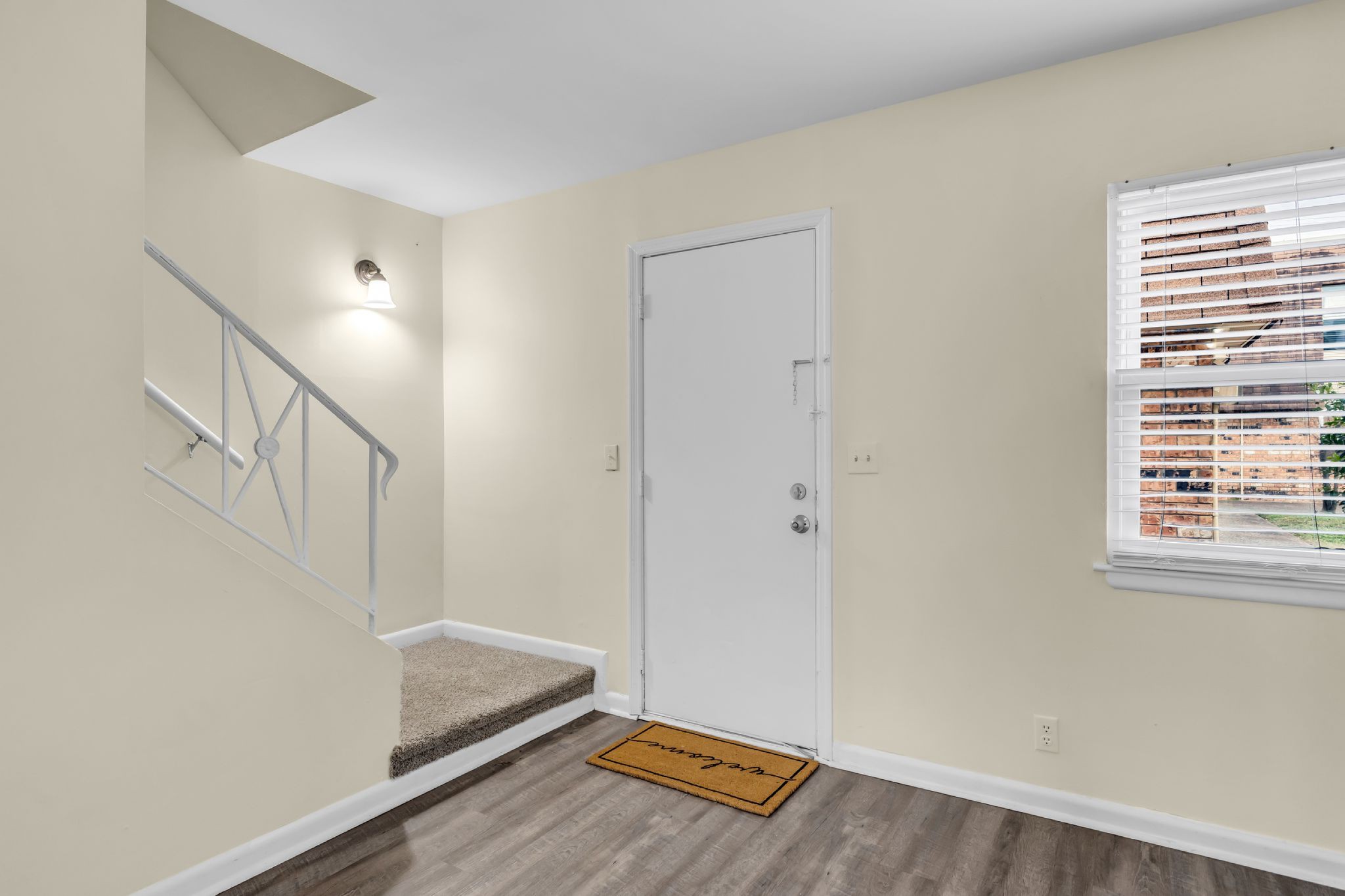 370 Wallace Road, Unit F5 Nashville, TN 37211 - Photo 8 of 28 a view of room with stairs and wooden floor