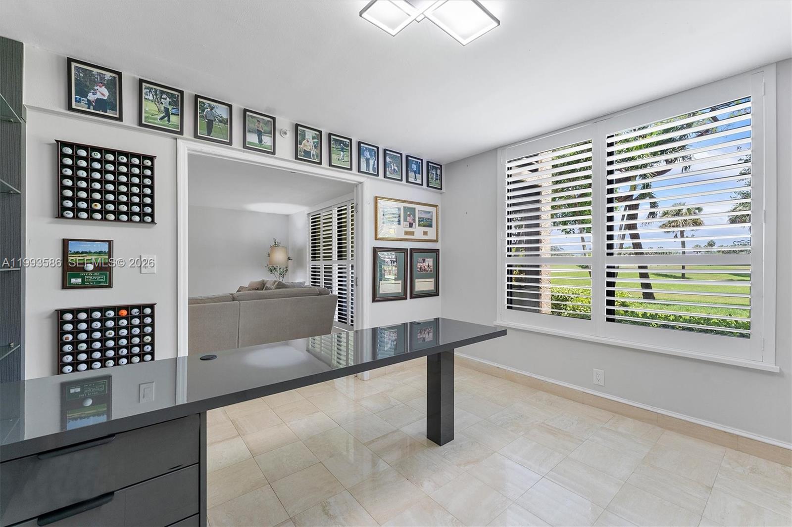 7225 Promenade Drive, Unit 102 Boca Raton, FL 33433 - Photo 11 of 21 a view of an empty room with a window