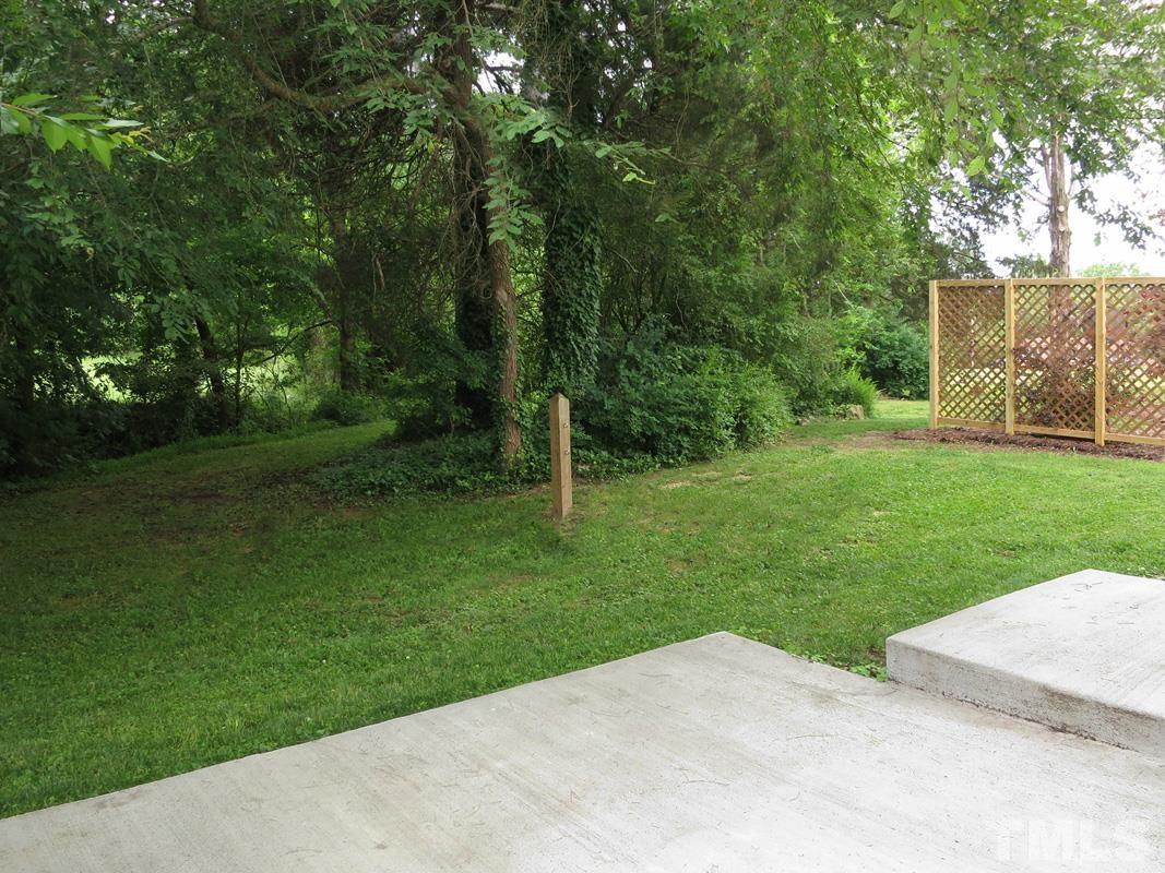 303 West Poplar Avenue, Unit B Carrboro, NC 27510 - Photo 13 of 16 a view of a park with a trees