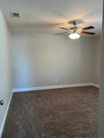 a view of empty room with window