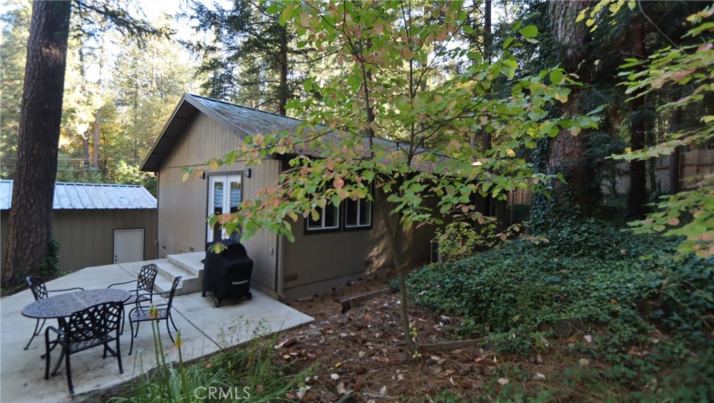 15815 Bottle Rock Road Middletown, CA 95461 - Photo 18 of 20 a view of backyard with outdoor seating a patio and plants