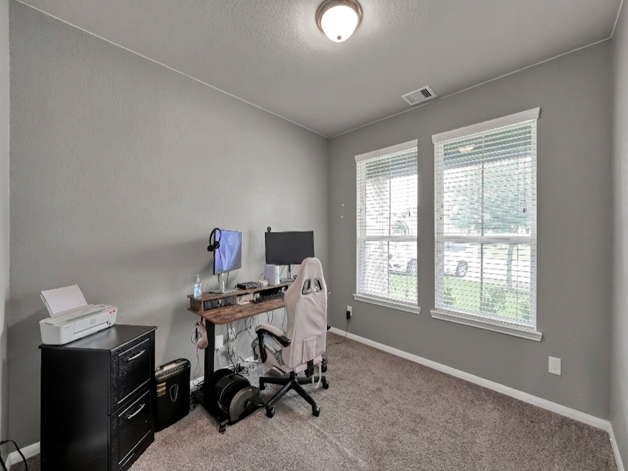 29211 Sequoia Tree Trail Spring, TX 77386 - Photo 3 of 32 a view of a workspace with furniture and a window