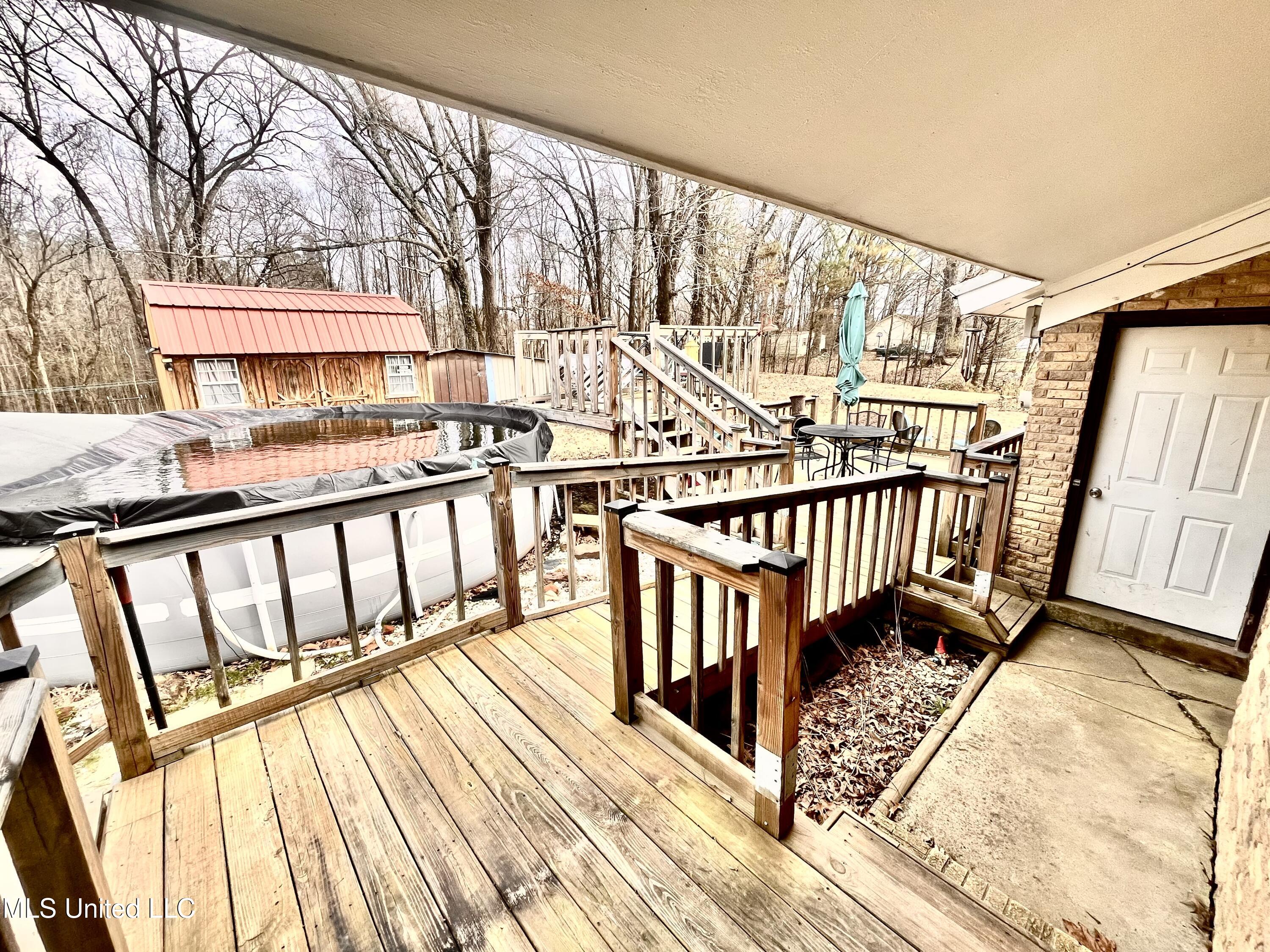 83 Sunset Acres Road Holly Springs, MS 38635 - Photo 16 of 20 deck utility room