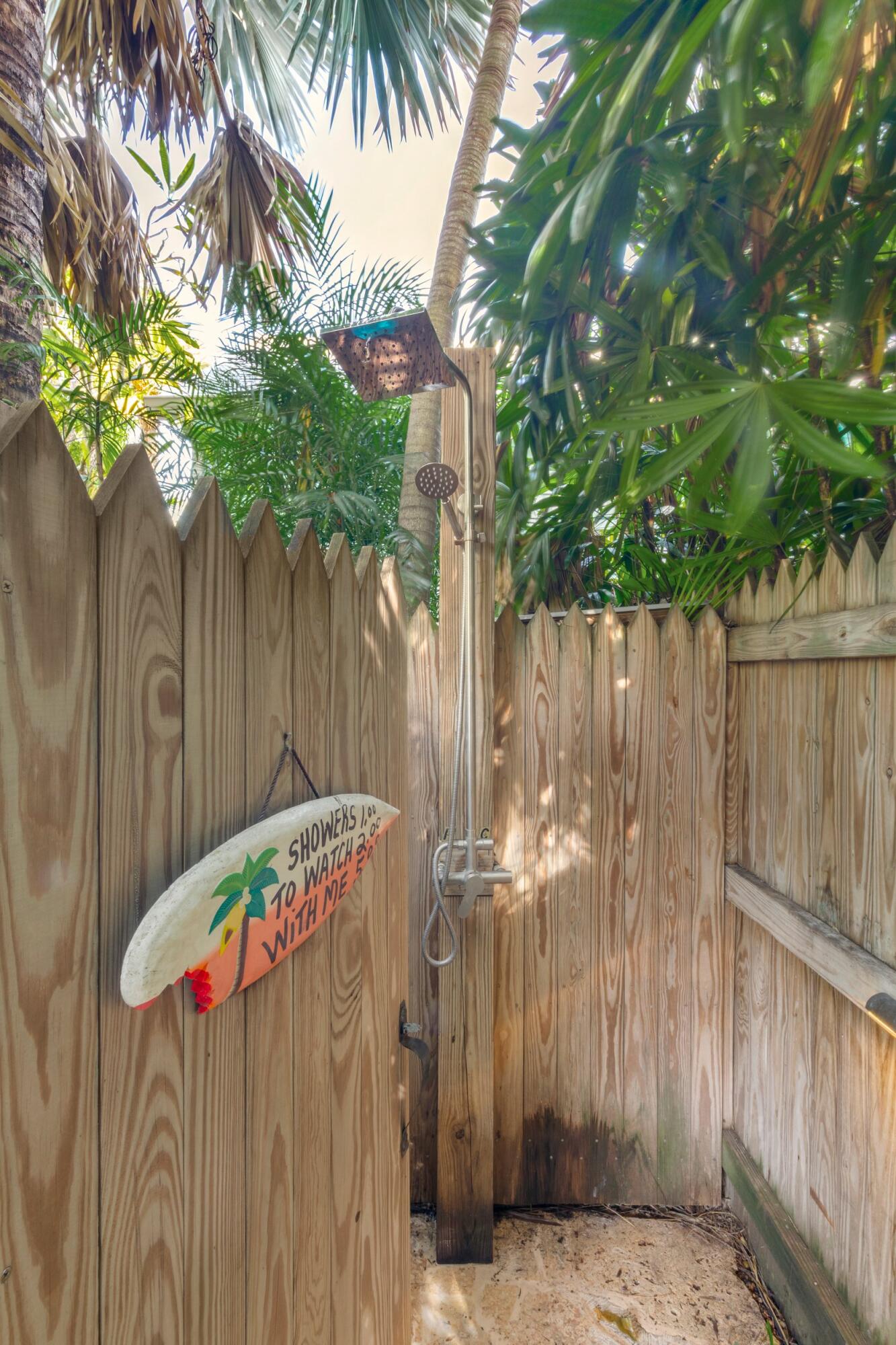 409 Grinnell Street Key West, FL 33040 - Photo 25 of 47 a view of a wooden fence