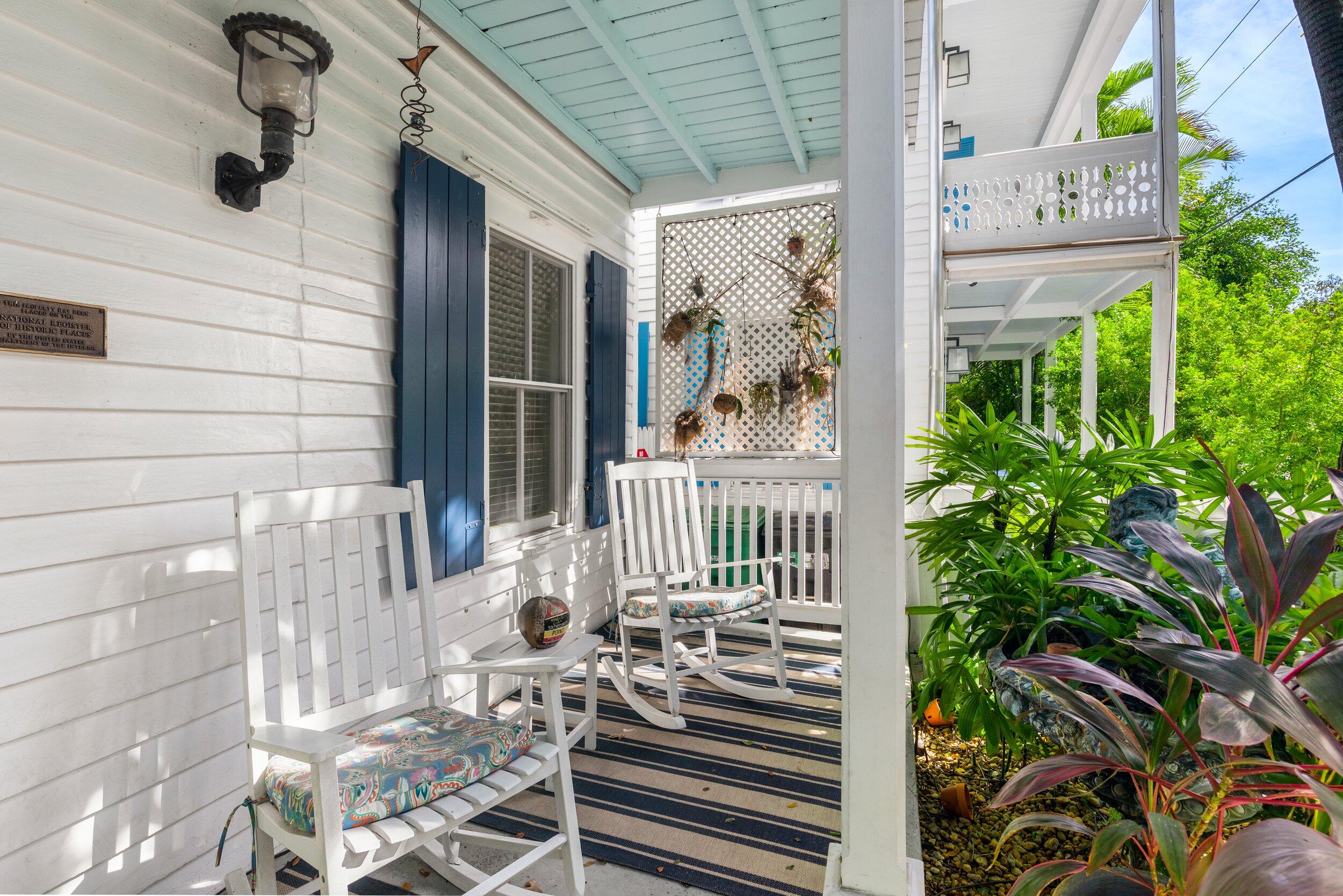 409 Grinnell Street Key West, FL 33040 - Photo 42 of 47 a view of a porch with seating space