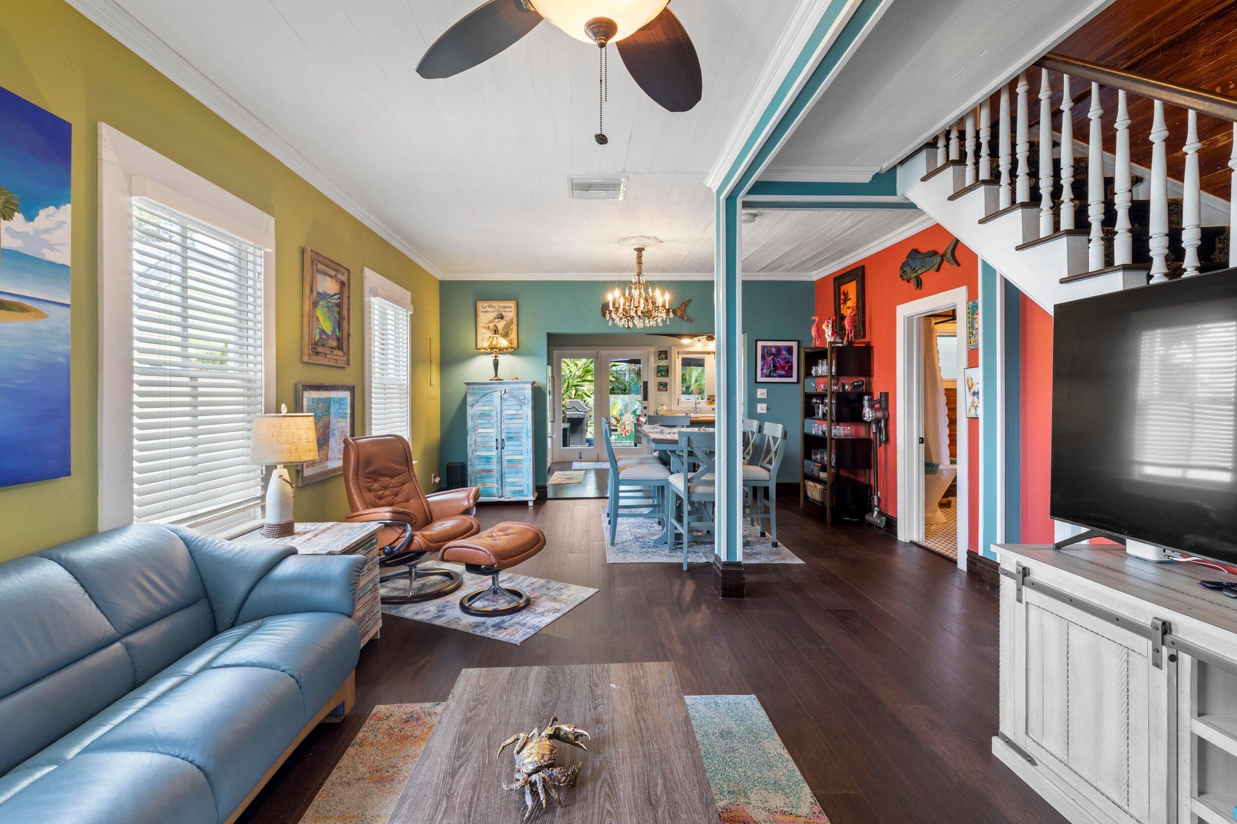 409 Grinnell Street Key West, FL 33040 - Photo 7 of 47 a living room with furniture and a flat screen tv