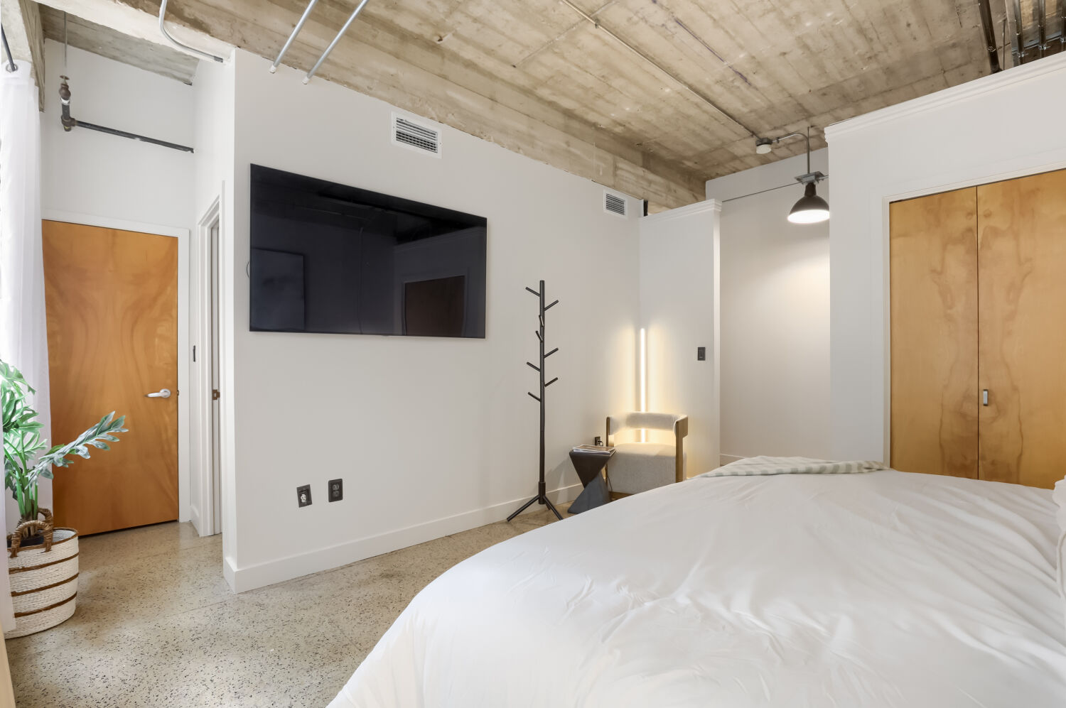 710 Colorado Street, Unit 4A Austin, TX 78701 - Photo 16 of 40 The bedroom provides ample space for a king sized bed, furniture and more.