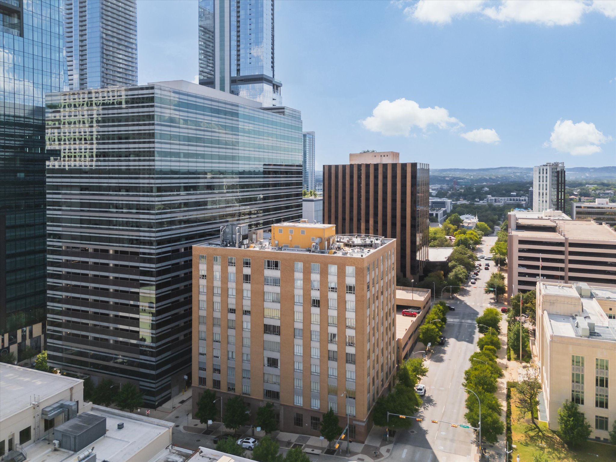 710 Colorado Street, Unit 4A Austin, TX 78701 - Photo 37 of 40 MAJOR discount on property taxes (up to 75% off!) due to Historic Exemption, as this 10-story high-rise is on the National Registry of Historic Places.