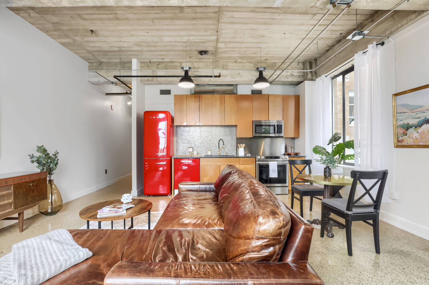 710 Colorado Street, Unit 4A Austin, TX 78701 - Photo 6 of 40 Luminous open concept living makes it easy to stay connected.