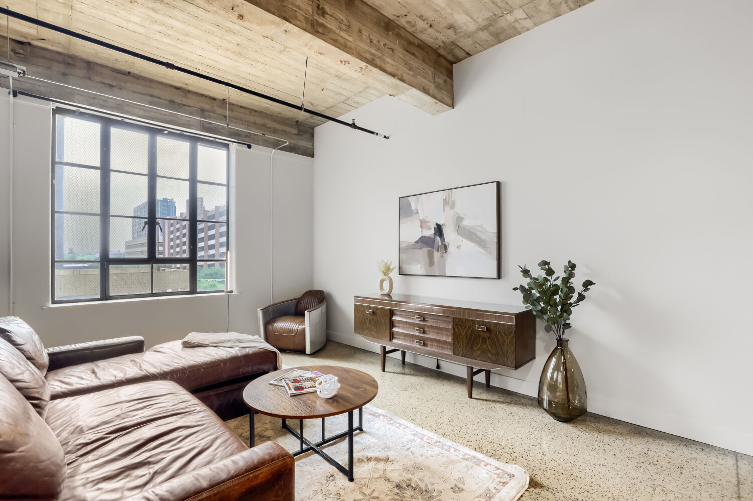 710 Colorado Street, Unit 4A Austin, TX 78701 - Photo 39 of 40 The spacious open concept floor plan offers excellent flexibility for configuring your ideal living dining, and work spaces.