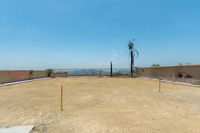 a view of a swimming pool and an empty room