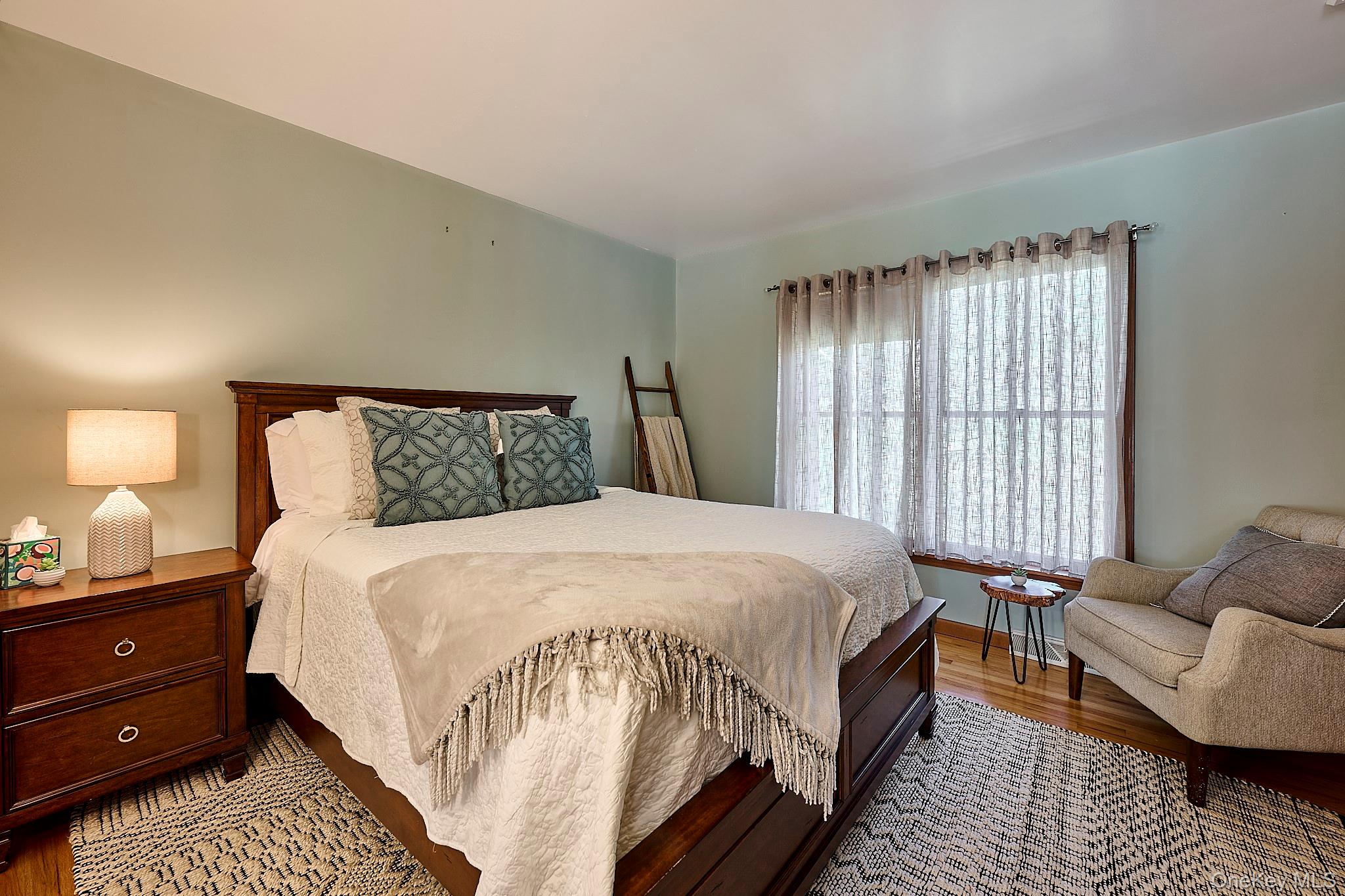 39 Pitio Road Glen Spey, NY 12737 - Photo 16 of 45 a bedroom with a bed and a couch