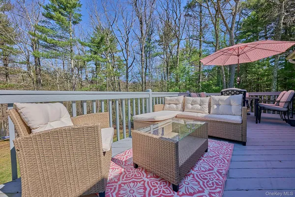 a sitting area with furniture and outdoor view