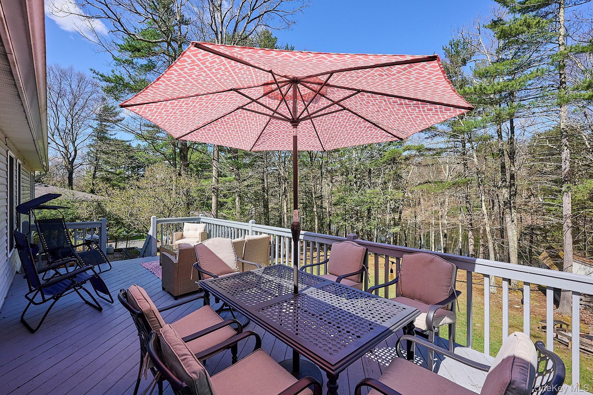 39 Pitio Road Glen Spey, NY 12737 - Photo 30 of 45 an outdoor sitting area with furniture and wooden deck
