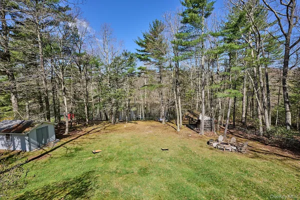 a view of a fountain with a backyard