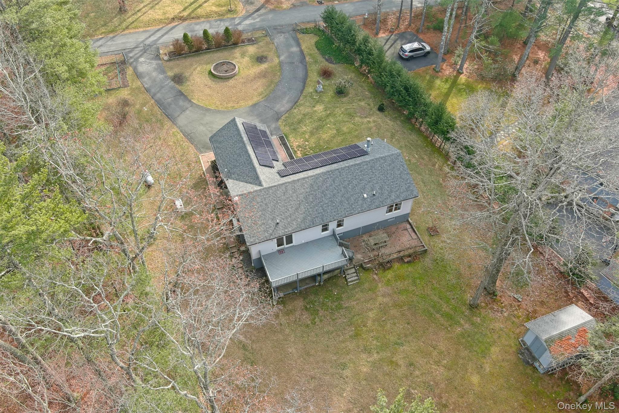 39 Pitio Road Glen Spey, NY 12737 - Photo 42 of 45 an aerial view of a house with outdoor space and a lake view