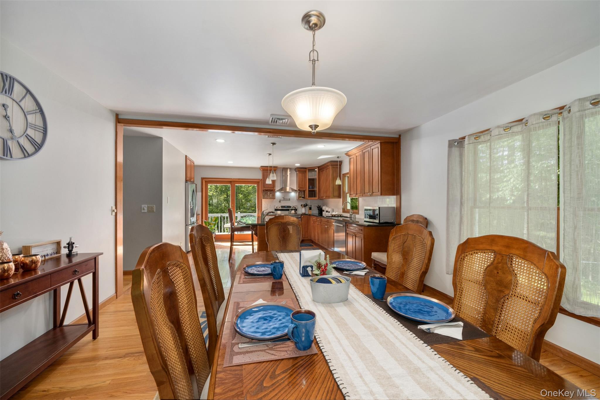 39 Pitio Road Glen Spey, NY 12737 - Photo 10 of 45 a view of a dining room with furniture window and wooden floor