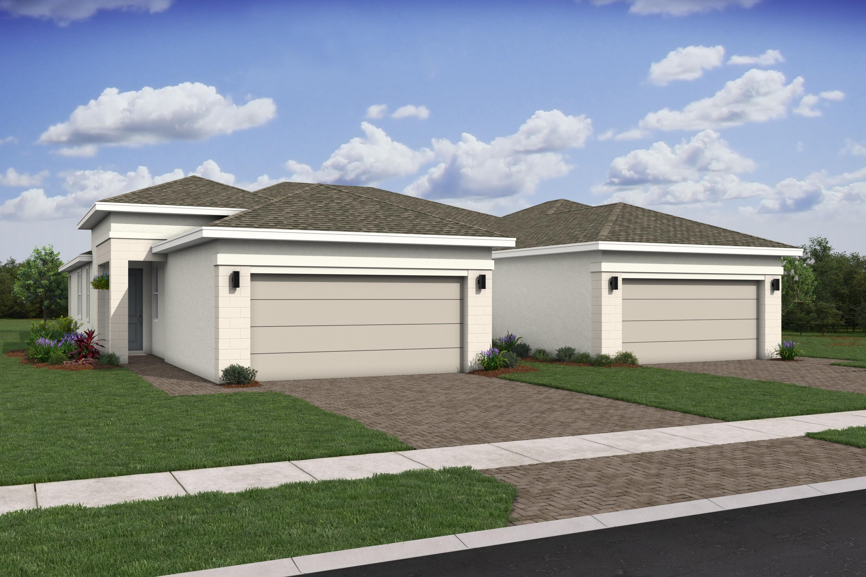10099 Dreamweaver Road, Unit 51 Port St. Lucie, FL 34987 - Photo 1 of 36 a front view of a house with a yard and garage