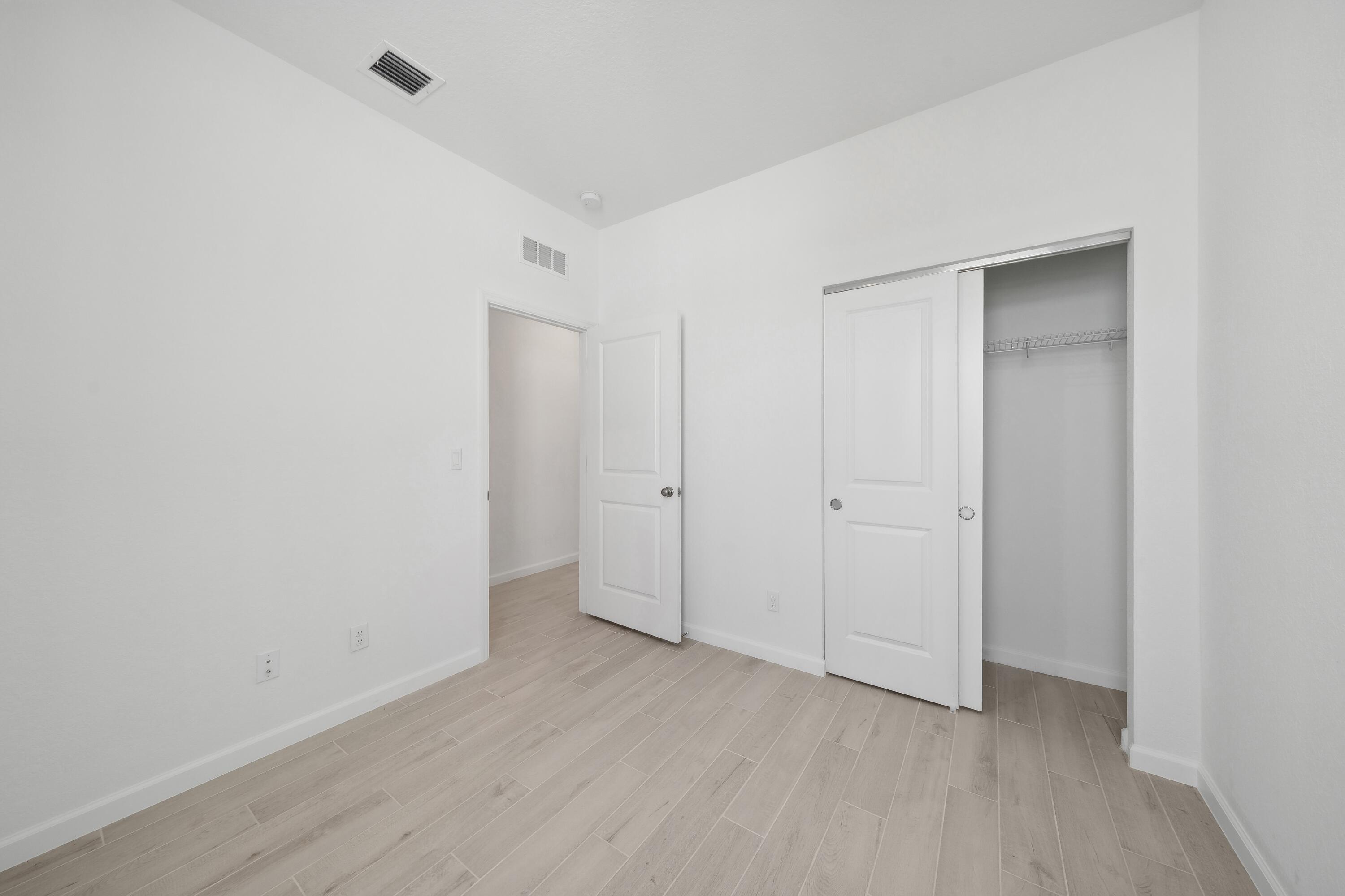 10099 Dreamweaver Road, Unit 51 Port St. Lucie, FL 34987 - Photo 19 of 36 a view of an empty room