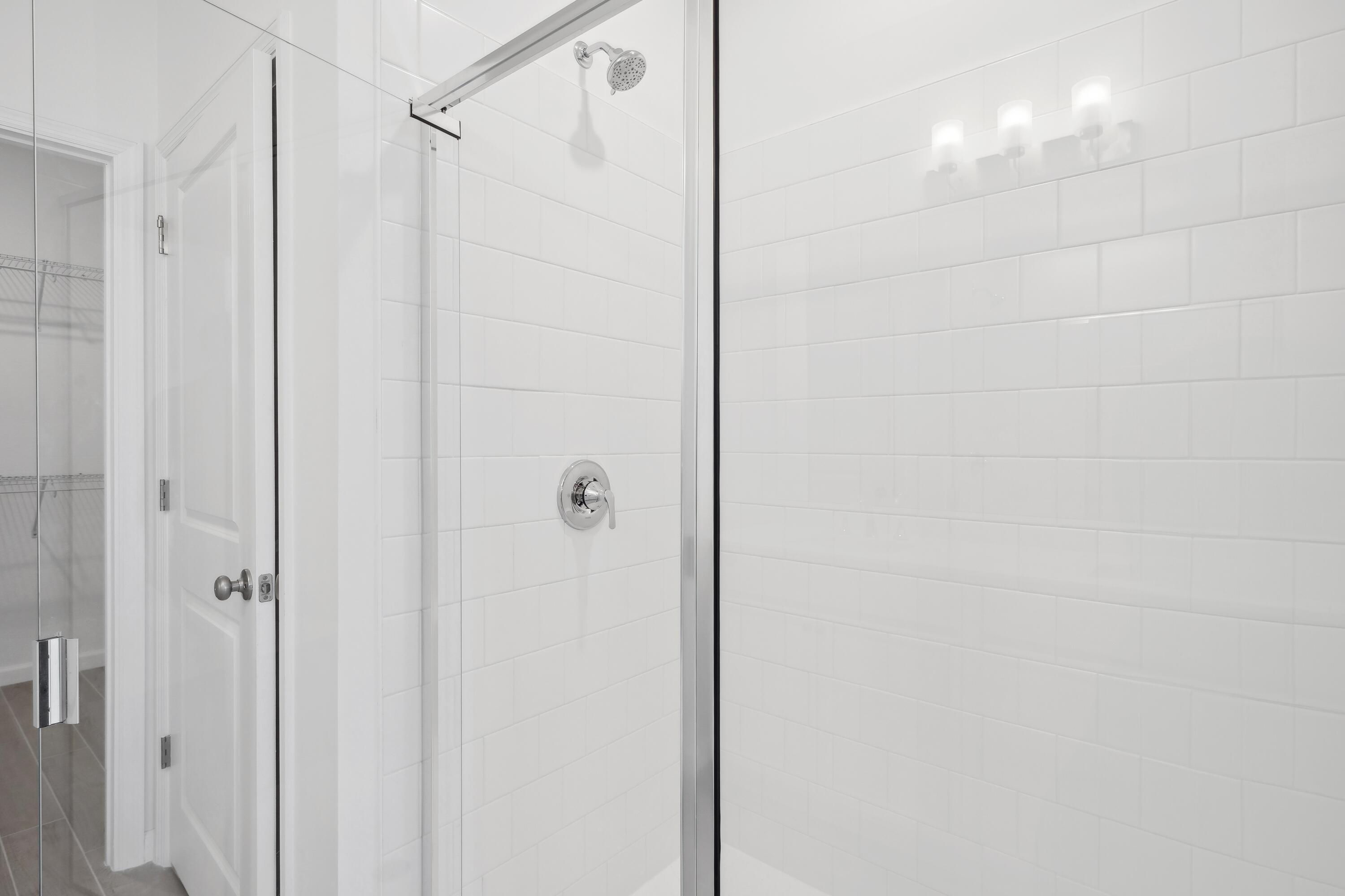 10099 Dreamweaver Road, Unit 51 Port St. Lucie, FL 34987 - Photo 21 of 36 a bathroom with a shower